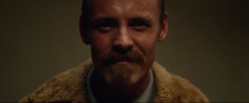 Movie still from “BlacKkKlansman” (2018), directed by Spike Lee – A person with a mustache; Close Up shot, Low angle