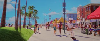 Movie still from “Scoob!” (2020), directed by Tony Cervone – A group of people walking down a sidewalk; Extreme Wide shot, Over the shoulder angle