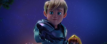 Movie still from “Scoob!” (2020), directed by Tony Cervone – A boy in a blue suit is standing in front of a wall; Close Up shot, High angle