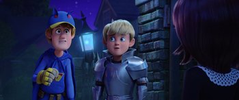 Movie still from “Scoob!” (2020), directed by Tony Cervone – A boy in a suit of armor and a boy in a blue hat; Medium shot, Over the shoulder angle