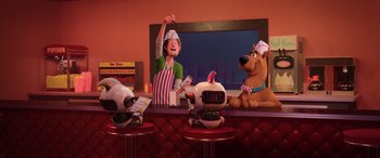 Movie still from “Scoob!” (2020), directed by Tony Cervone – A scene from the animated series's cooby - doo and the gang; Wide shot, High angle