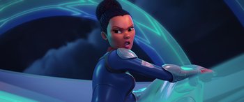 Movie still from “Scoob!” (2020), directed by Tony Cervone – An animated woman in a blue outfit is looking at the camera; Medium shot, Over the shoulder angle