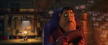 Movie still from “Scoob!” (2020), directed by Tony Cervone – A man in a purple jacket looking at his reflection in a mirror; Close Up shot, Over the shoulder angle