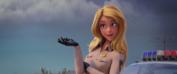 Movie still from “Scoob!” (2020), directed by Tony Cervone – A woman in a police uniform holding out her hand; Close Up shot, Over the shoulder angle