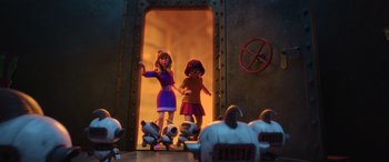 Movie still from “Scoob!” (2020), directed by Tony Cervone – A couple of people standing next to each other on skateboards; Wide shot, Low angle