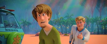 Movie still from “Scoob!” (2020), directed by Tony Cervone – A cartoon of a man with a surprised look on his face; Close Up shot, Over the shoulder angle