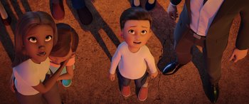 Movie still from “Scoob!” (2020), directed by Tony Cervone – An animated boy standing in front of a group of people; Medium shot, High angle