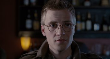 Movie still from “Scott Pilgrim vs. the World” (2010), directed by Edgar Wright – A person wearing glasses and a jacket; Close Up shot, Low angle