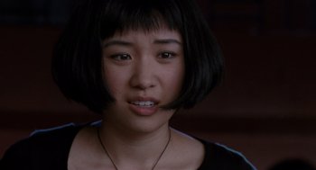 Movie still from “Scott Pilgrim vs. the World” (2010), directed by Edgar Wright – A person with short black hair; Close Up shot, Over the shoulder angle