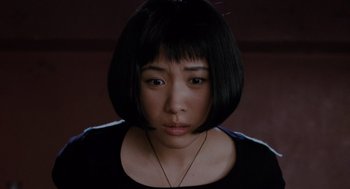 Movie still from “Scott Pilgrim vs. the World” (2010), directed by Edgar Wright – A person with short black hair; Close Up shot, High angle