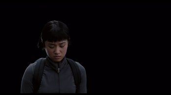 Movie still from “Scott Pilgrim vs. the World” (2010), directed by Edgar Wright – A woman with a backpack is looking down at her face; Close Up shot, Low angle