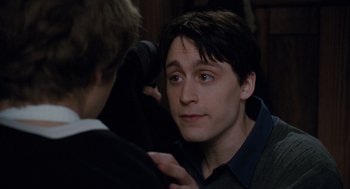 Movie still from “Scott Pilgrim vs. the World” (2010), directed by Edgar Wright – A young man is looking at another young man; Close Up shot, Over the shoulder angle