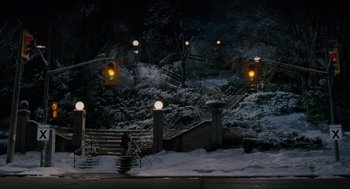 Movie still from “Scott Pilgrim vs. the World” (2010), directed by Edgar Wright – A person walking down a snow covered sidewalk; Extreme Wide shot, High angle
