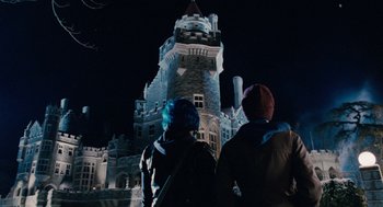 Movie still from “Scott Pilgrim vs. the World” (2010), directed by Edgar Wright – Two people standing in front of a castle at night; Wide shot, Low angle