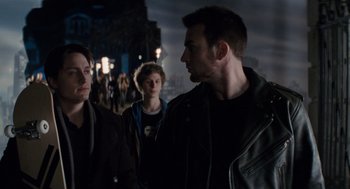 Movie still from “Scott Pilgrim vs. the World” (2010), directed by Edgar Wright – A group of people walking down a street at night; Medium shot, Over the shoulder angle