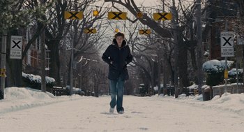 Movie still from “Scott Pilgrim vs. the World” (2010), directed by Edgar Wright – A woman walking down a snow covered street; Wide shot, Low angle