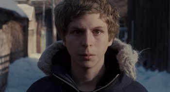 Movie still from “Scott Pilgrim vs. the World” (2010), directed by Edgar Wright – A young man with brown hair wearing a hooded jacket; Close Up shot, Low angle