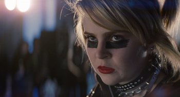 Movie still from “Scott Pilgrim vs. the World” (2010), directed by Edgar Wright – A woman with black eye makeup and red lipstick; Close Up shot, Over the shoulder angle