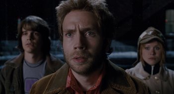 Movie still from “Scott Pilgrim vs. the World” (2010), directed by Edgar Wright – A person wearing a brown jacket; Close Up shot, Over the shoulder angle