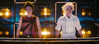 Movie still from “Scott Pilgrim vs. the World” (2010), directed by Edgar Wright – Two men standing next to each other in front of a mirror; Medium shot, Low angle