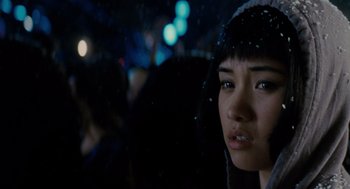 Movie still from “Scott Pilgrim vs. the World” (2010), directed by Edgar Wright – A woman with a hat on looking into the distance; Close Up shot, Over the shoulder angle