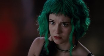 Movie still from “Scott Pilgrim vs. the World” (2010), directed by Edgar Wright – A woman with green hair looking at the camera; Close Up shot, Over the shoulder angle