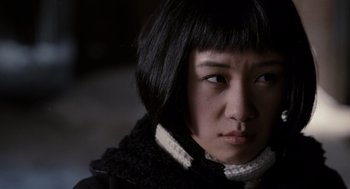 Movie still from “Scott Pilgrim vs. the World” (2010), directed by Edgar Wright – A person wearing a black jacket; Close Up shot, Over the shoulder angle