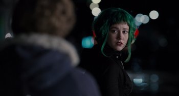Movie still from “Scott Pilgrim vs. the World” (2010), directed by Edgar Wright – A woman with green hair standing next to a man; Close Up shot, Over the shoulder angle