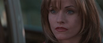 Movie still from “Scream” (1996), directed by Wes Craven – A woman's eyes and lips; Close Up shot, Over the shoulder angle