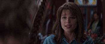 Movie still from “Scream” (1996), directed by Wes Craven – A person with long hair; Close Up shot, Over the shoulder angle