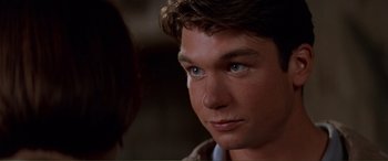 Movie still from “Scream 2” (1997), directed by Wes Craven – A person with blue eyes; Close Up shot, Over the shoulder angle