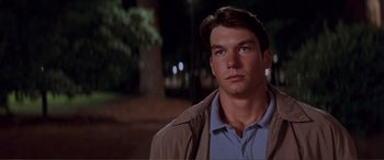 Movie still from “Scream 2” (1997), directed by Wes Craven – A person wearing a shirt and jacket; Close Up shot, Low angle