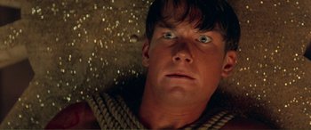 Movie still from “Scream 2” (1997), directed by Wes Craven – A person with a rope around his neck; Close Up shot, Low angle