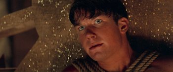 Movie still from “Scream 2” (1997), directed by Wes Craven – A person looking up at the sky; Close Up shot, Low angle