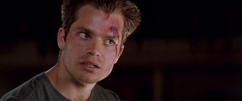 Movie still from “Scream 2” (1997), directed by Wes Craven – A person with a face injury; Close Up shot, Low angle