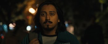 Movie still from “Scream VI” (2023), directed by Matt Bettinelli-Olpin – A person with long black hair; Close Up shot, Low angle