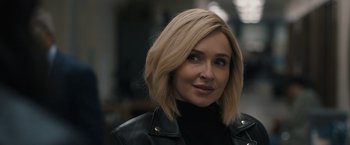 Movie still from “Scream VI” (2023), directed by Matt Bettinelli-Olpin – A person wearing a black jacket; Close Up shot, Over the shoulder angle