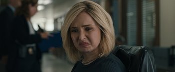 Movie still from “Scream VI” (2023), directed by Matt Bettinelli-Olpin – A person wearing a black shirt; Close Up shot, Low angle