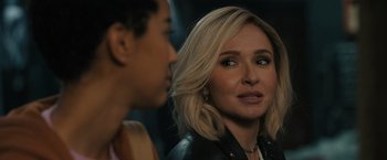 Movie still from “Scream VI” (2023), directed by Matt Bettinelli-Olpin – A woman in a leather jacket looking at a man in a leather jacket; Close Up shot, Over the shoulder angle