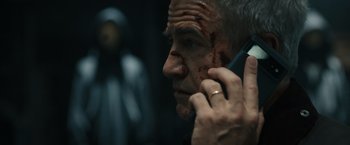 Movie still from “Scream VI” (2023), directed by Matt Bettinelli-Olpin – A person talking on a cell phone; Close Up shot, Low angle