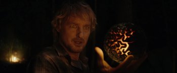 Movie still from “Secret Headquarters” (2022), directed by Henry Joost – A man is holding an object in front of him; Close Up shot, Over the shoulder angle