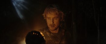 Movie still from “Secret Headquarters” (2022), directed by Henry Joost – A person holding a candle; Close Up shot, Over the shoulder angle