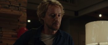 Movie still from “Secret Headquarters” (2022), directed by Henry Joost – A person wearing a shirt; Close Up shot, Low angle