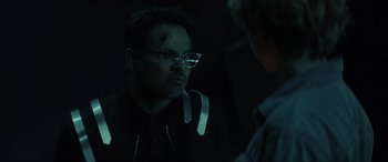 Movie still from “Secret Headquarters” (2022), directed by Henry Joost – A man wearing glasses looking at himself in a mirror; Close Up shot, Over the shoulder angle