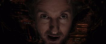 Movie still from “Secret Headquarters” (2022), directed by Henry Joost – A man's face in a dark room; Extreme Close Up shot, Overhead angle