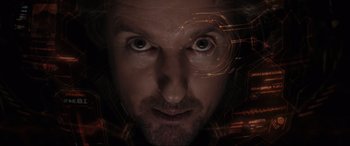 Movie still from “Secret Headquarters” (2022), directed by Henry Joost – A man's face in a dark room; Extreme Close Up shot, Overhead angle