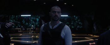 Movie still from “Secret Headquarters” (2022), directed by Henry Joost – A person wearing a vest; Medium shot, Low angle