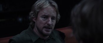 Movie still from “Secret Headquarters” (2022), directed by Henry Joost – A person with long blonde hair; Close Up shot, Over the shoulder angle