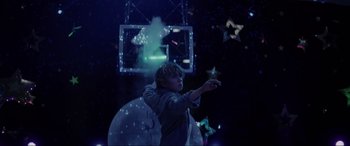 Movie still from “Secret Headquarters” (2022), directed by Henry Joost – A man is holding something in his hand; Medium shot, Low angle