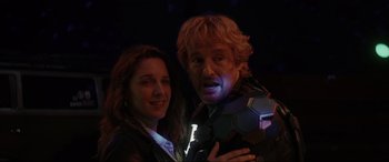 Movie still from “Secret Headquarters” (2022), directed by Henry Joost – A man and a woman posing for a picture; Close Up shot, Over the shoulder angle